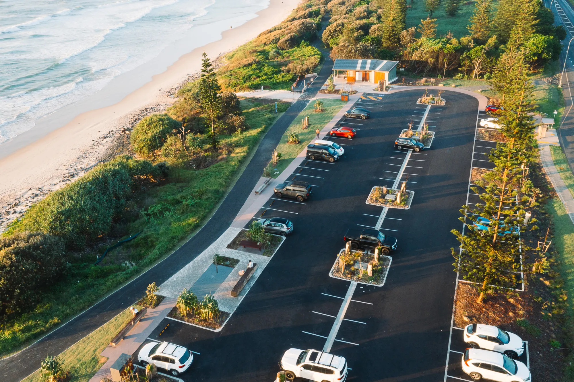 Sharpes Beach carpark from the air, the beach along one side